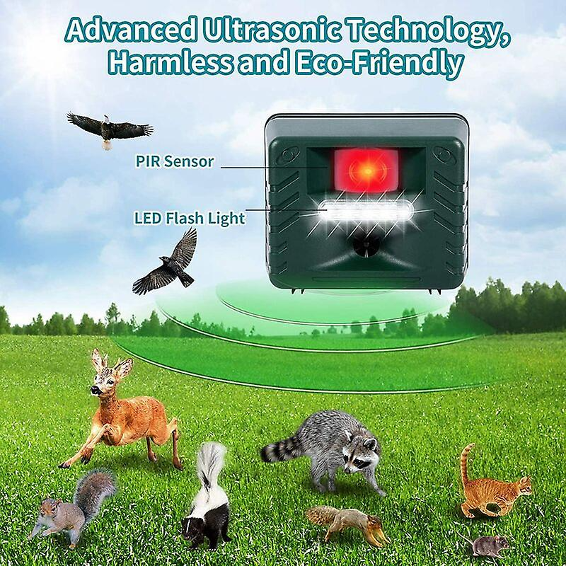 Close-up of an outdoor ultrasonic pest repeller with solar panel for humane bird control & garden protection.