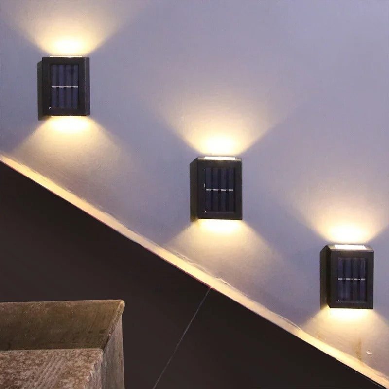 Decorative wireless solar LED wall light enhancing garden decor, perfect for automatic outdoor illumination.