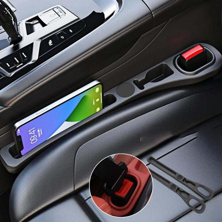 Passenger's side car seat gap filler, empty, showing its potential for extra auto storage.