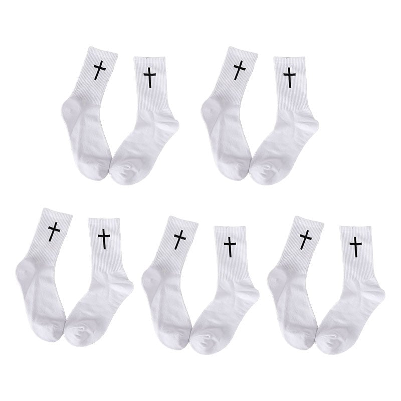 Detail shot of the elastic cuff and cross pattern on a black unisex cotton ankle sock