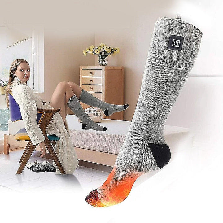 Unisex heated socks laid flat, displaying the soft fabric and design for comfort.