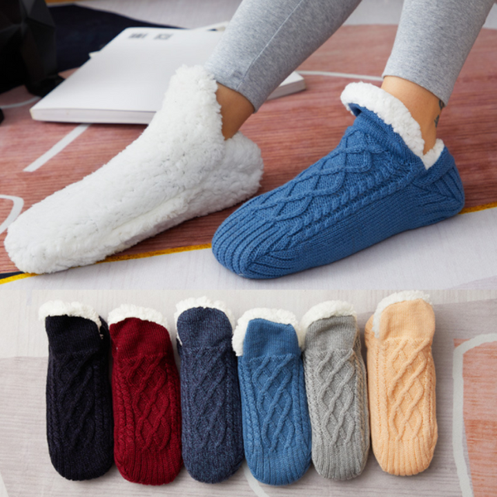 Pair of fluffy, warm unisex indoor slipper socks in grey, perfect for winter comfort and cozy homes.