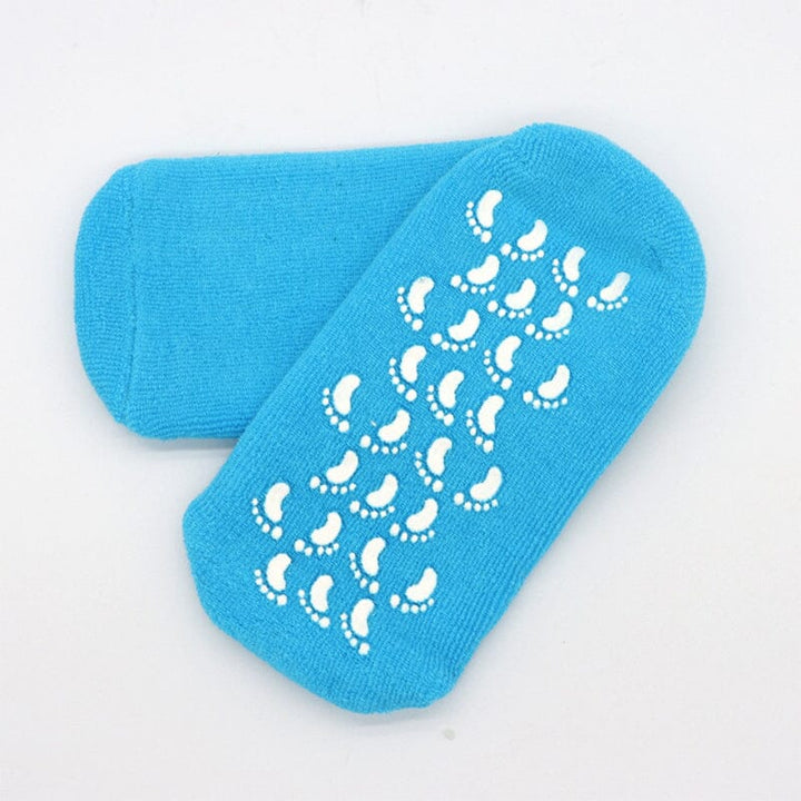 Gel socks laid flat, highlighting their full foot coverage for comprehensive dry feet remedy and hydration.