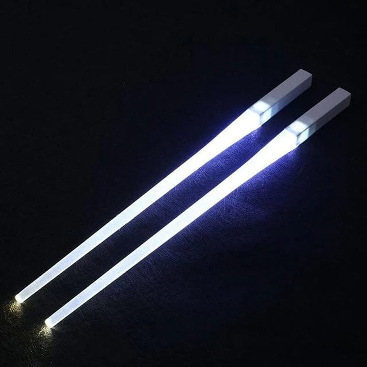Group of different colored Lightsaber LED chopsticks, showcasing the variety of novelty kitchen gifts.
