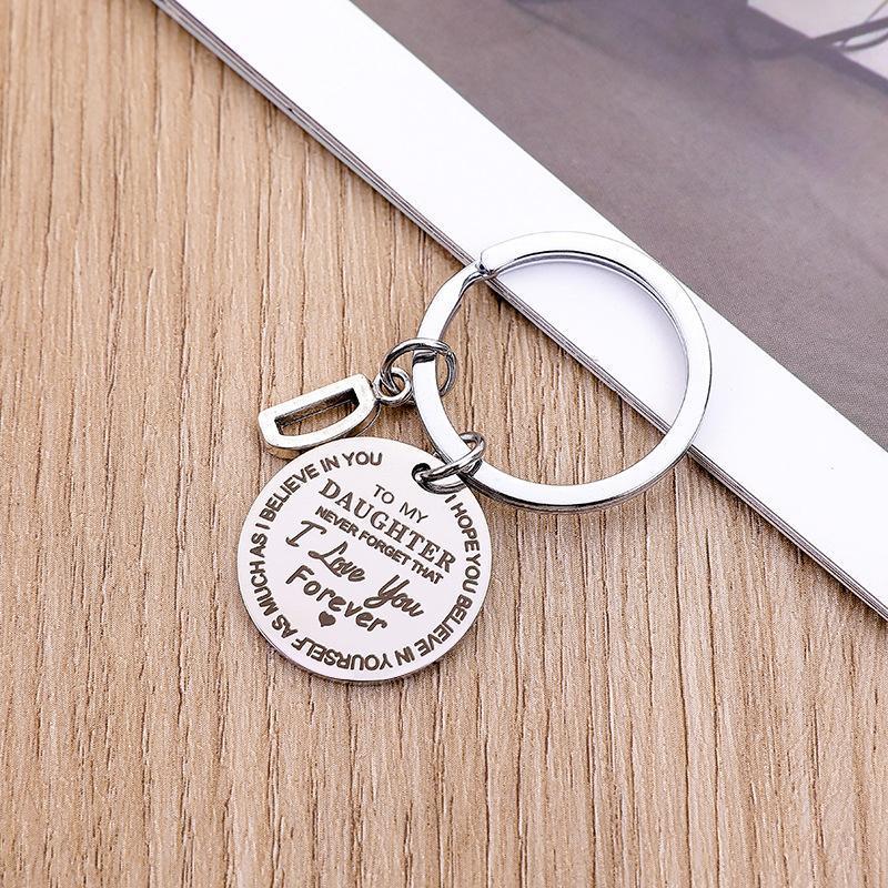 Personalized initial 'L' keychain with a sleek design, representing family love, an ideal gift for child.