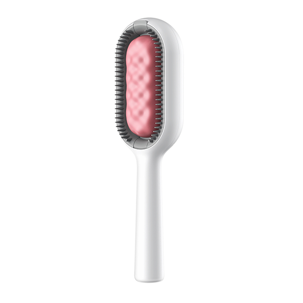 Efficient pet grooming brush with water dispenser, preventing static and dust during deshedding.