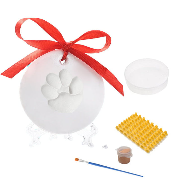 Assortment of pet paw impression keepsakes, showing different pet paw sizes and shapes