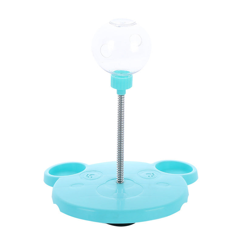 Interactive feeder for pets, dispenses treats for cats and dogs, pink color