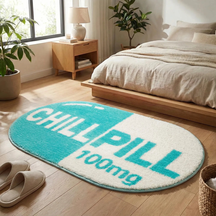 Modern pink & teal pill-shaped accent rugs with unique wave patterns, adding playful decor to your home.