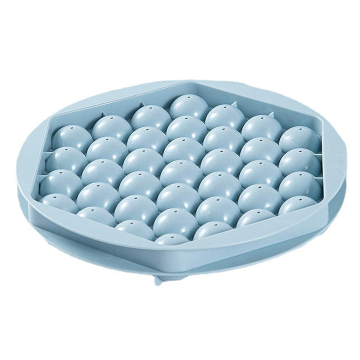 Blue ice sphere mold, an essential kitchen tool for high-quality cocktail ice.