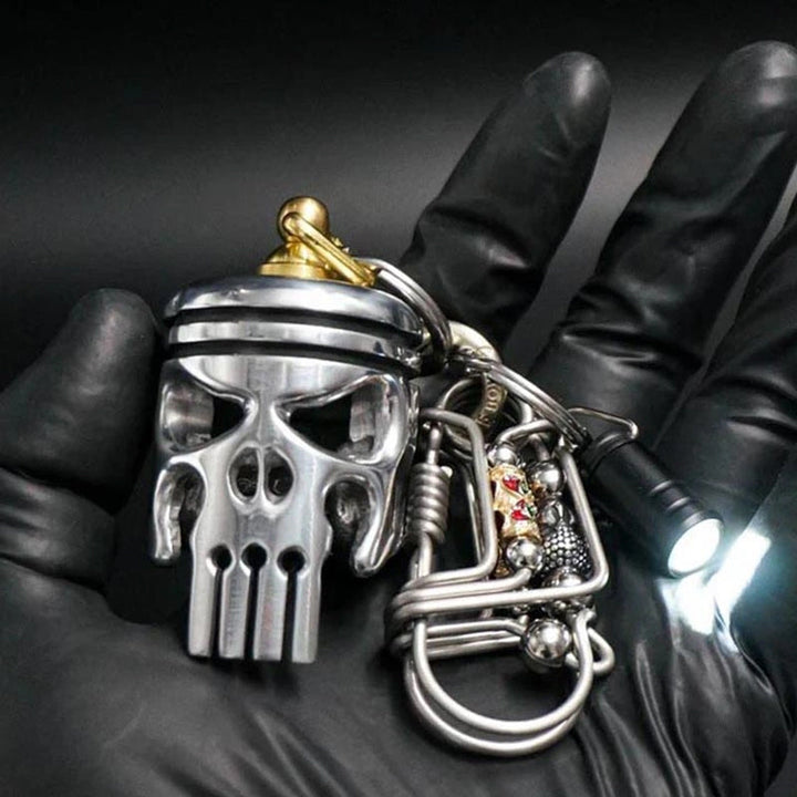 Artistic Piston Art Skull Keychain, handmade metal, motorcycle themed, bottle opener.