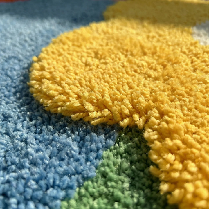 Soft Flowique floral area rug with playful waves, ideal for a comfortable playroom, modern bedroom or living room.