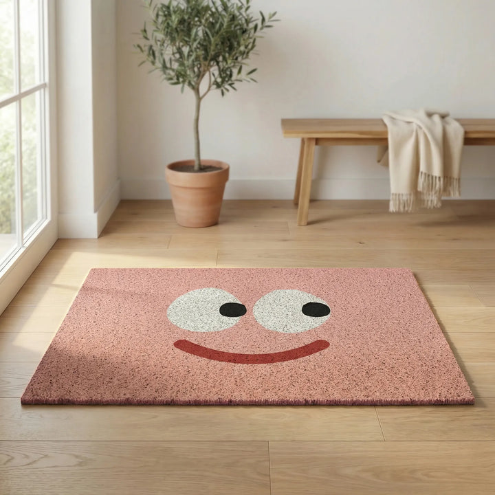 Non-slip indoor/outdoor doormat, Flowique wave pattern, adds playful touch to home decor.
