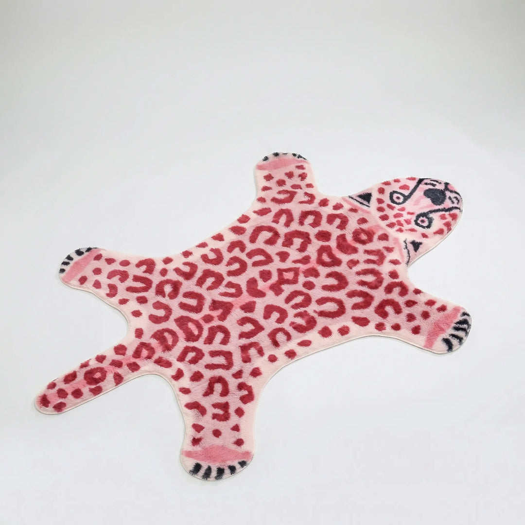 Soft animal print area rug (leopard pattern) with a unique wavy texture. Ideal statement rug for bedrooms or nurseries.