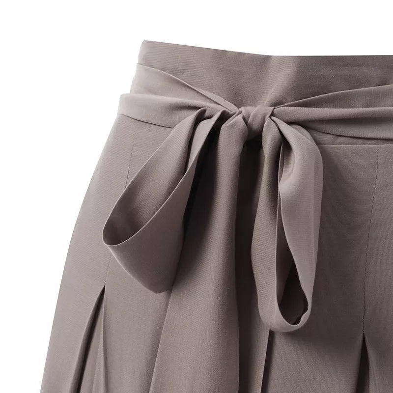 Modern plus-size high-waist palazzo pants, wide-leg design for elegant women's workwear.