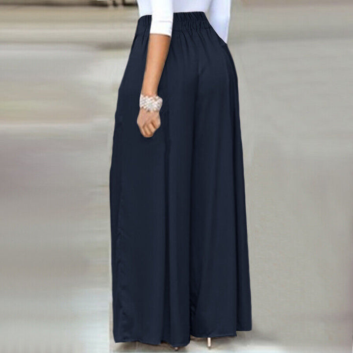 Stylish women's plus-size palazzo pants, wide-leg and high-waist for a chic professional look.
