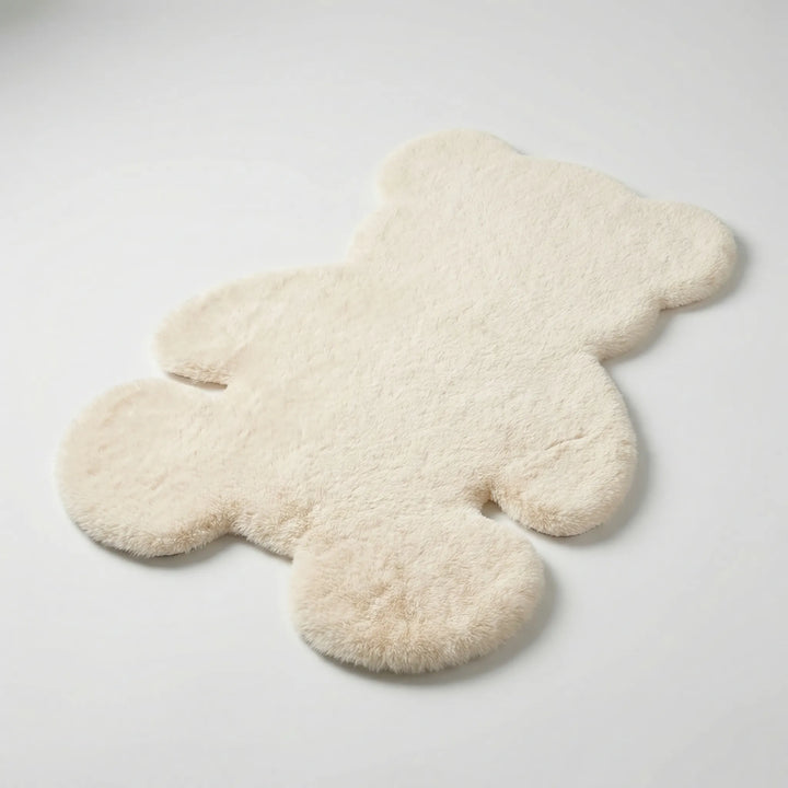 Flowique bear-shaped plush area rug with subtle waves, adding a soft, cozy accent to any room decor.