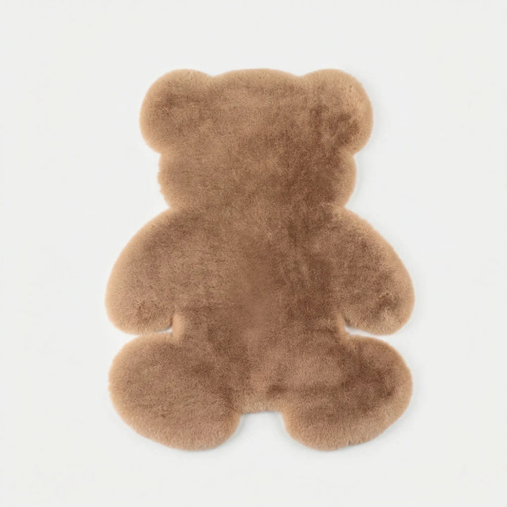 Luxurious plush bear-shaped rug, a soft and stylish accent area rug for cozy, kid-friendly home decor.