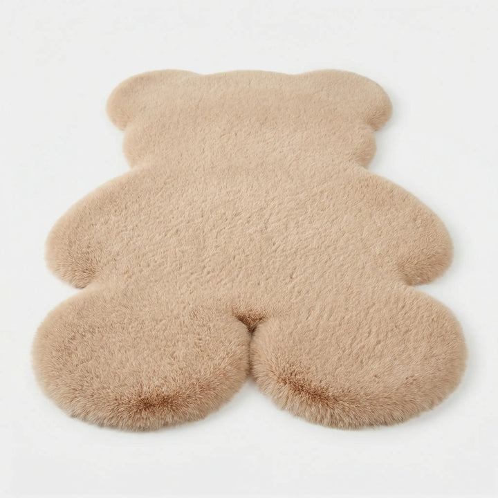 Soft gray plush teddy bear area rug. Cozy kids' play mat, perfect for nursery or child's room decor.