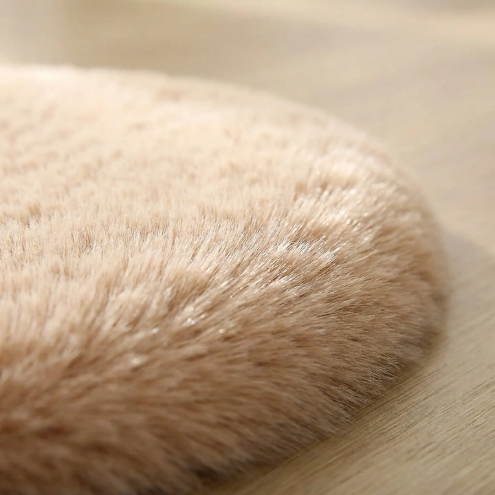 White plush bear statement area rug for kids. Cozy play mat with soft waves, ideal for nursery decor.