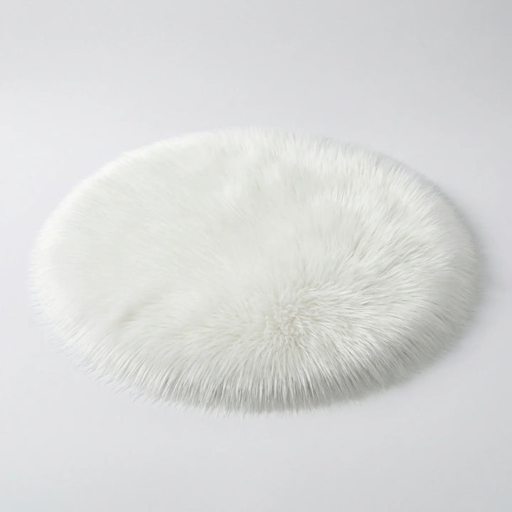 Flowique statement round rug featuring elegant wave patterns, perfect for modern home decor.