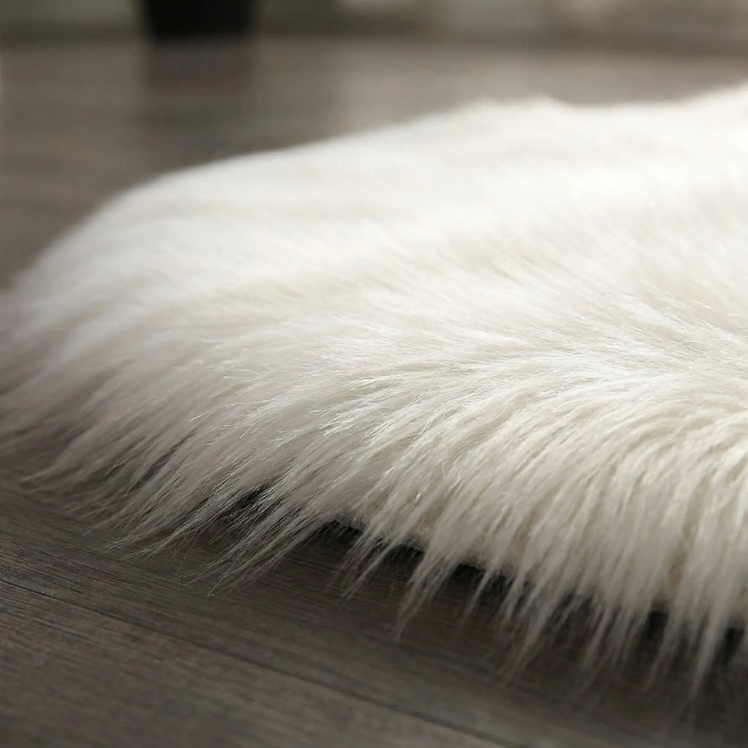 Soft plush round accent rug, ideal for adding warmth and style to any room.