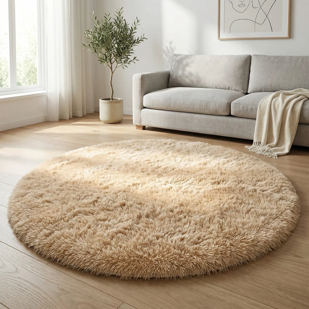 Plush round high pile area rug for cozy home comfort. Soft, wavy texture, ideal for living room or bedroom decor.