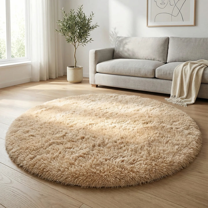 Plush round high pile area rug for cozy home comfort. Soft, wavy texture, ideal for living room or bedroom decor.