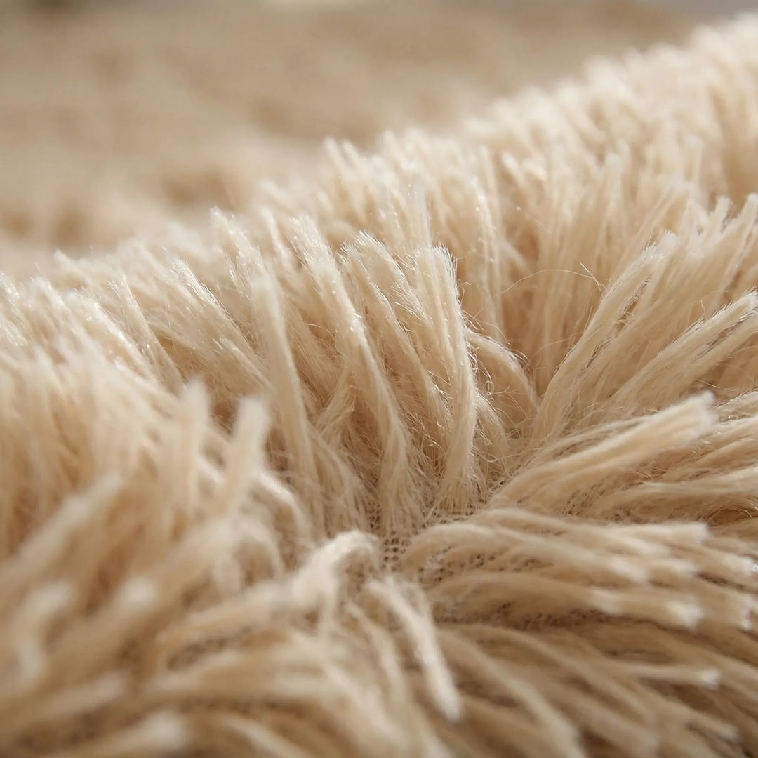Cozy round plush high pile area rug with a unique wavy design. Perfect soft statement piece for any modern home decor.