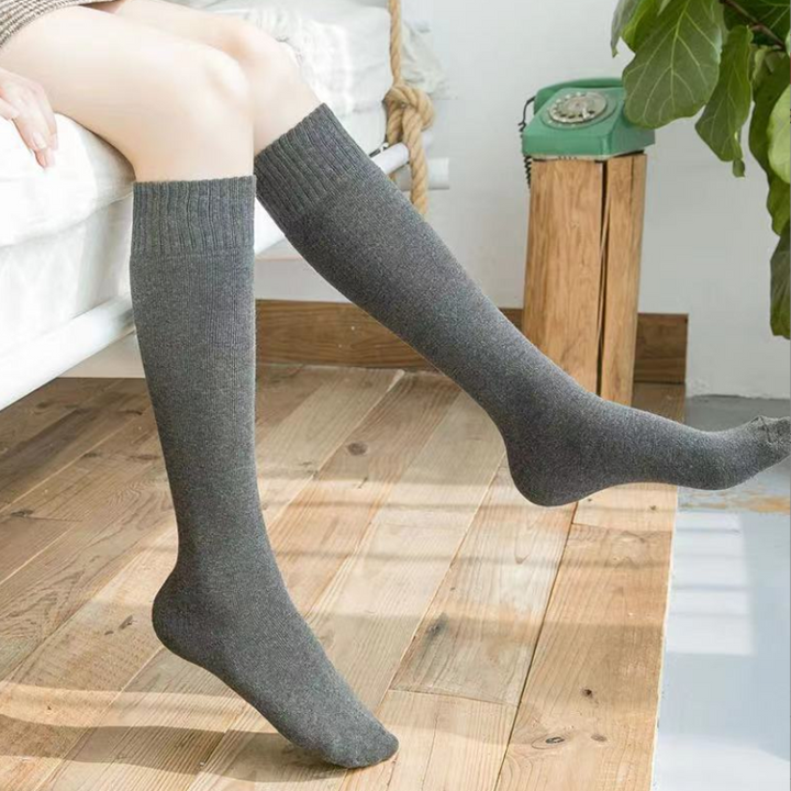 Winter-ready women's thick socks, over-the-knee style with a plush lining.
