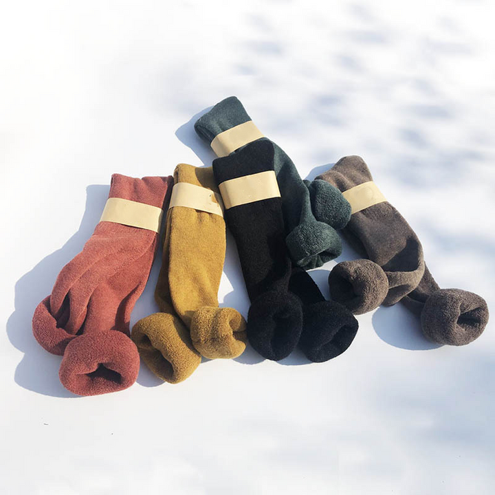 Cozy and warm women's over-the-knee socks, perfect for staying toasty in winter.
