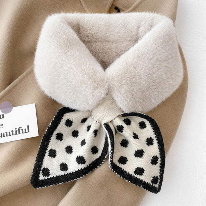 Elegant faux fur scarf in a luxurious plush texture, ideal for winter outdoor wear.
