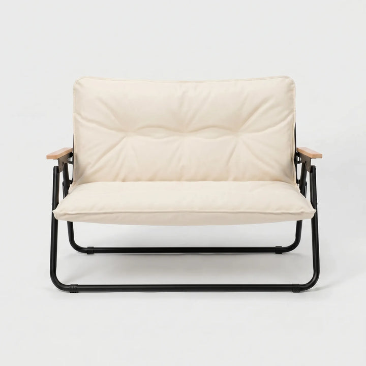 Folding 2-person camping sofa, durable outdoor seating solution for camp, patio, or events.