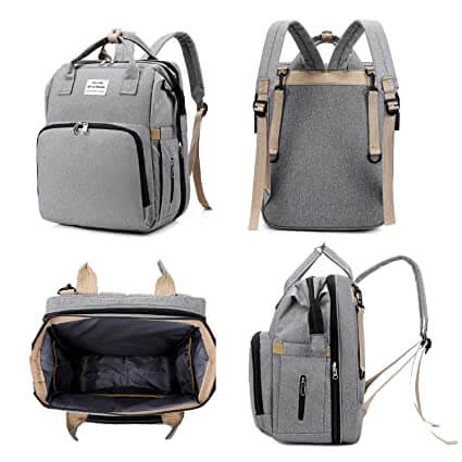 Easy access pockets on a multi-function baby bed & diaper bag, for quick reach.