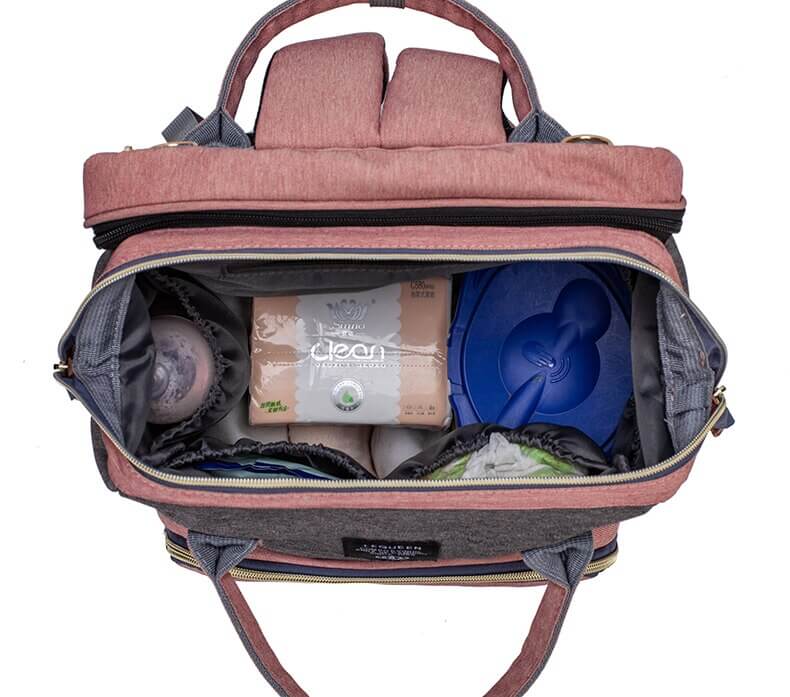 Durable travel backpack with integrated portable baby changing station for convenience.