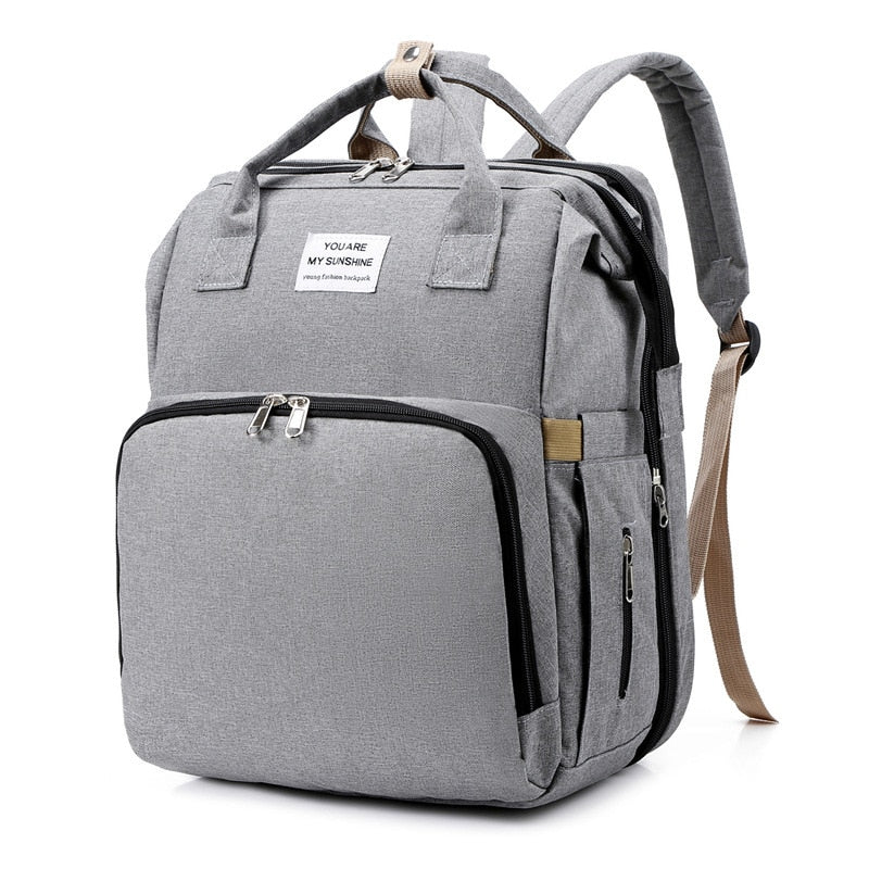 Multi-function diaper bag, organized compartments for all baby travel essentials & nappy changes.