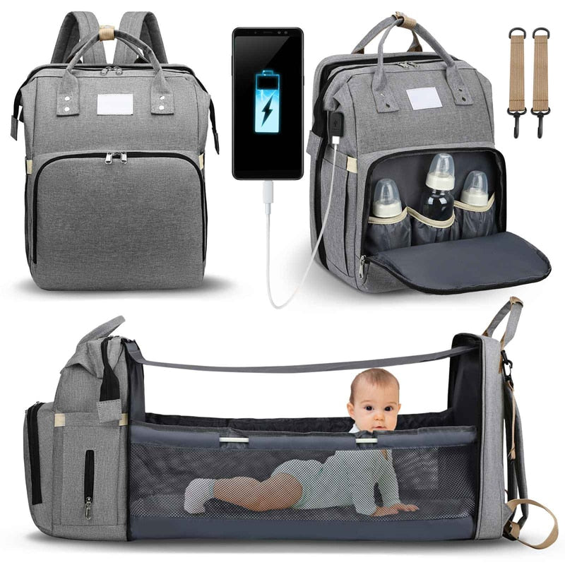 Waterproof multi-function travel diaper bag & portable baby bed, protecting essentials.