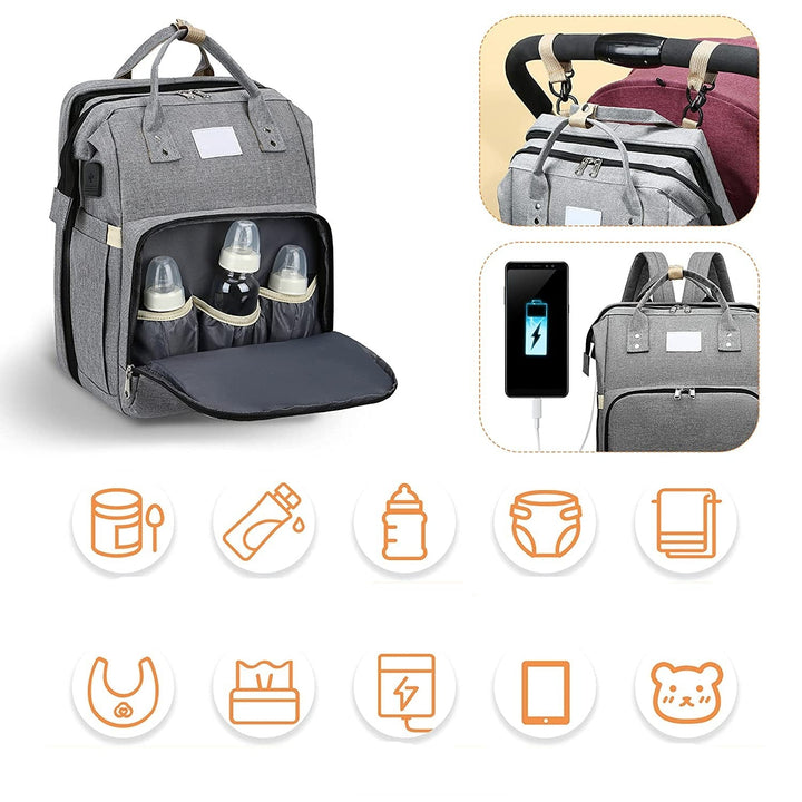 Unisex portable baby bed & nappy bag, modern design for stylish parents on the go.