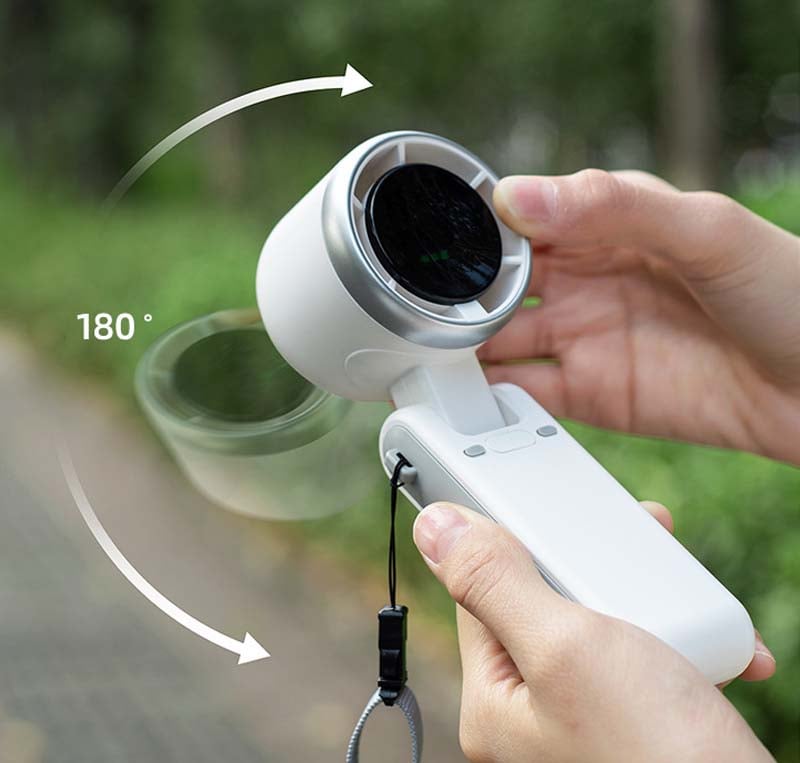 Compact travel fan with high-speed turbine, essential cooling device for trips