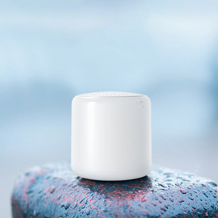 Portable wireless mini speaker, waterproof, hands-free, clear sound in a compact build