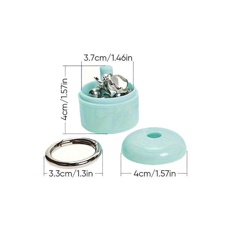 Small aluminum pill organizer attached to keys, ideal for daily medication or tiny earrings