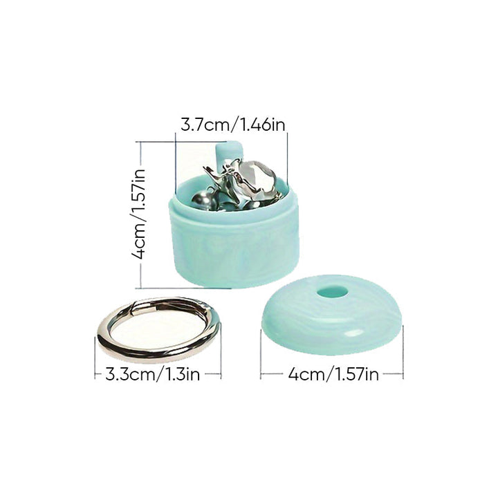 Small aluminum pill organizer attached to keys, ideal for daily medication or tiny earrings