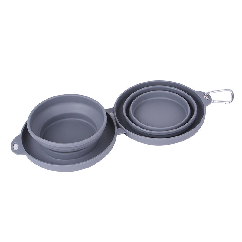 Pet owner preparing the blue silicone travel diner set for a road trip, filling with kibble