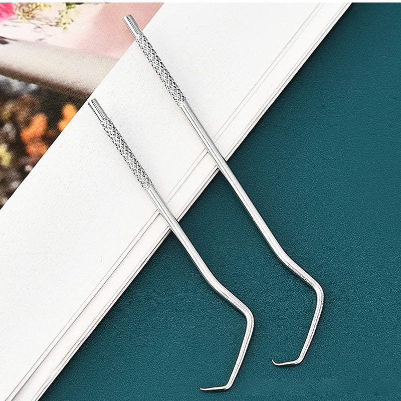 Portable outdoor gear: stainless steel toothpick set, essential for camping & hiking hygiene.