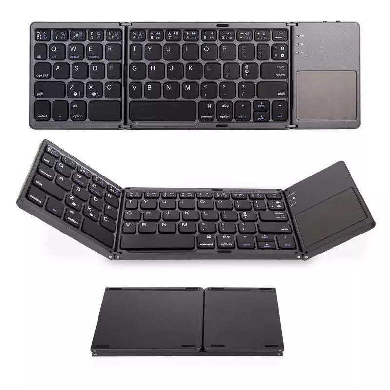 User typing on a portable tri-fold wireless keyboard with touchpad, enhancing mobile efficiency