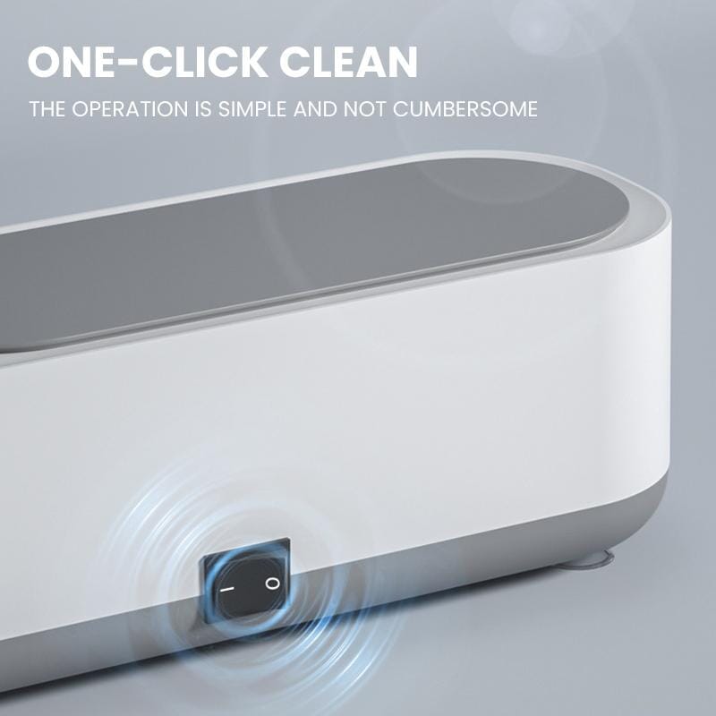 User cleaning eyeglasses in a portable ultrasonic cleaner, clear and hygienic results