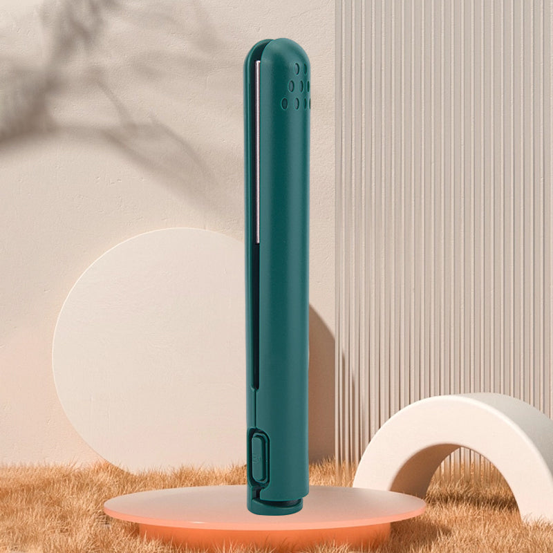 Curling a section of hair with the versatile USB-powered mini hair tool, creating soft waves.