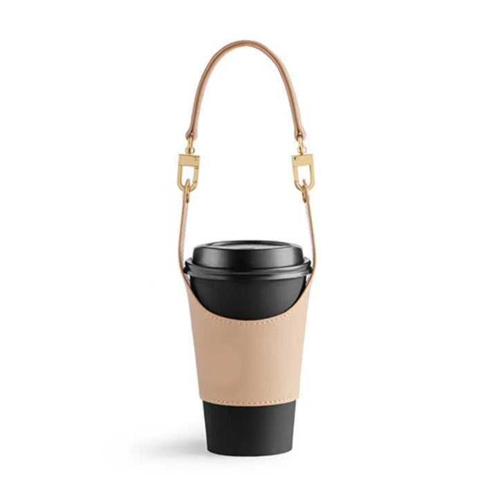 Unfolded portable vegan leather drink carrier, displaying compartments for two standard cups