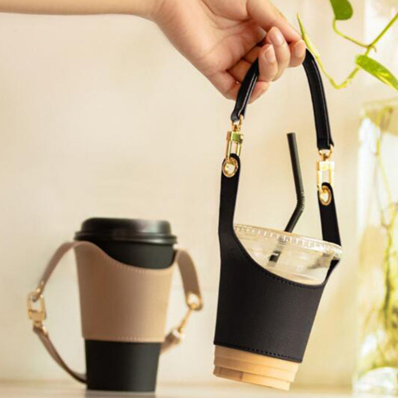 Empty portable vegan leather cup holder, highlighting its compact and foldable design for storage