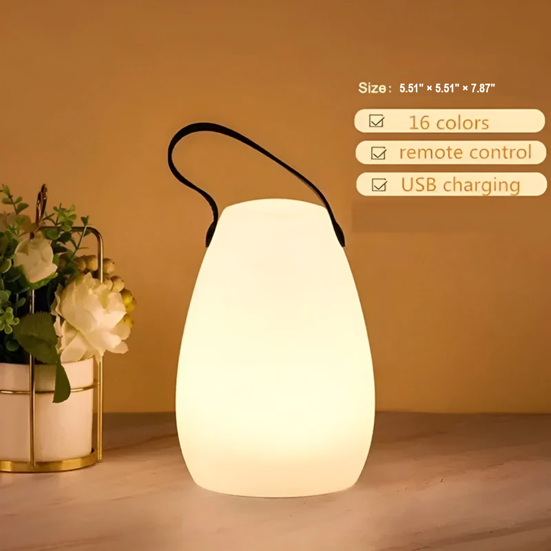 Rechargeable wireless LED lamp, waterproof, provides indoor/outdoor table lighting.